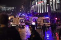 Rescue services and ambulances rush to the scene of explosions near the Besiktas football club stadium after attacks in Istanbul, late Saturday, Dec. 10, 2016. Two loud explosions have been heard near the newly built soccer stadium and witnesses at the scene said gunfire could be heard in what appeared to have been an armed attack on police. Turkish authorities have banned distribution of images relating to the Istanbul explosions within Turkey.(AP Photo/Halit Onur Sandal)