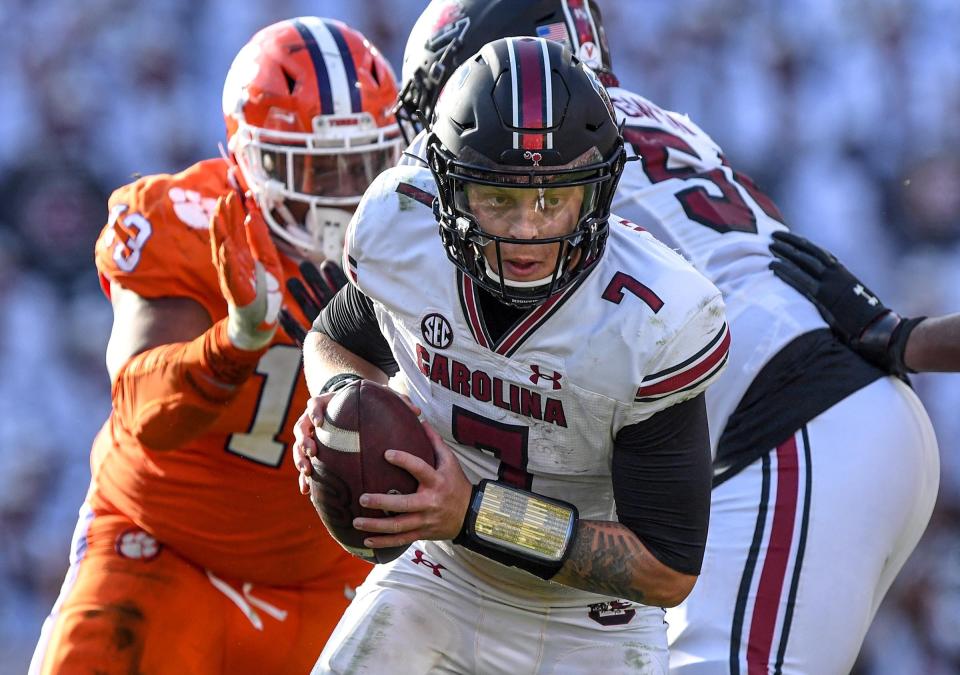 South Carolina quarterback Spencer Rattler looks for an opening against Clemson on Nov. 26.