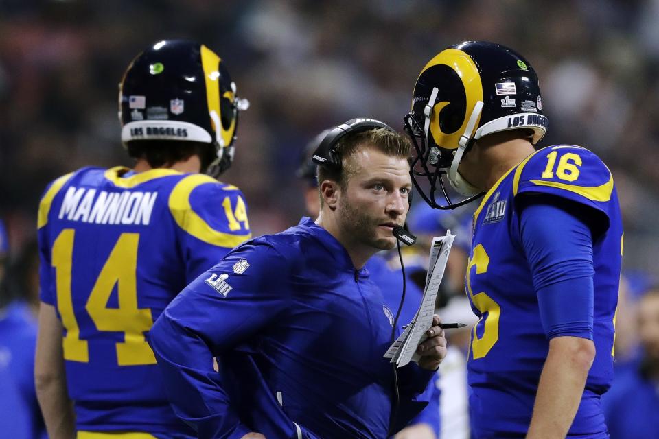 Los Angeles Rams head coach Sean McVay, center, speaks to Jared Goff (16) on the sideline during the second half of the NFL Super Bowl 53 football game against the New England Patriots, Sunday, Feb. 3, 2019, in Atlanta. (AP Photo/John Bazemore)