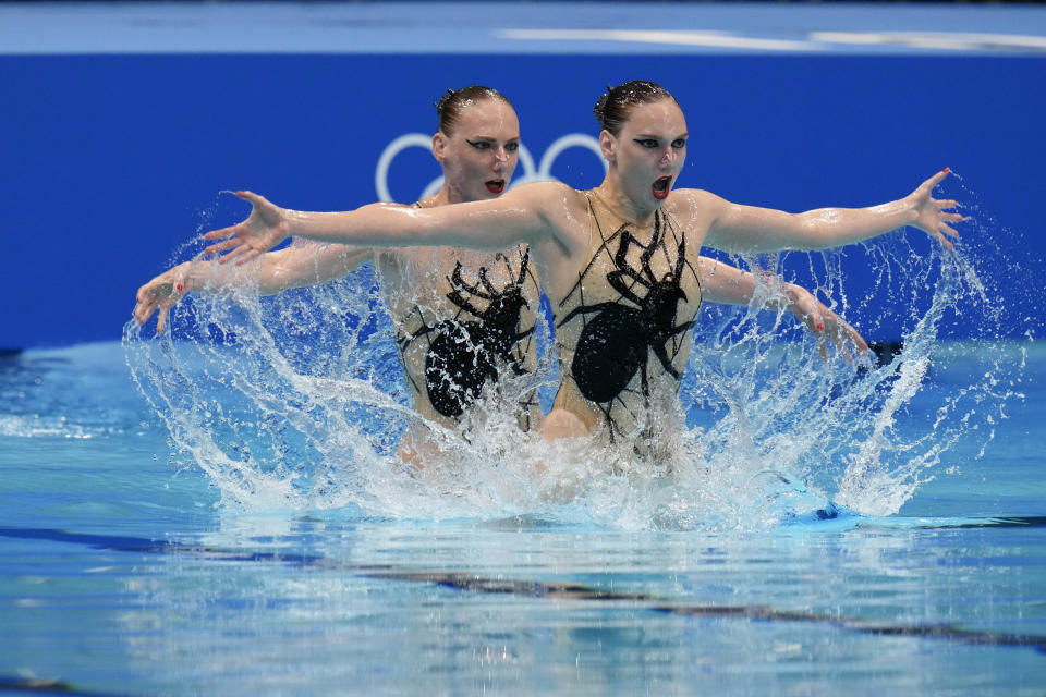 Svetlana Kolesnichenko and Svetlana Romashina of Russian Olympic Committee compete in the duet free routine final at the the 2020 Summer Olympics, Wednesday, Aug. 4, 2021, in Tokyo, Japan. (AP Photo/Alessandra Tarantino)