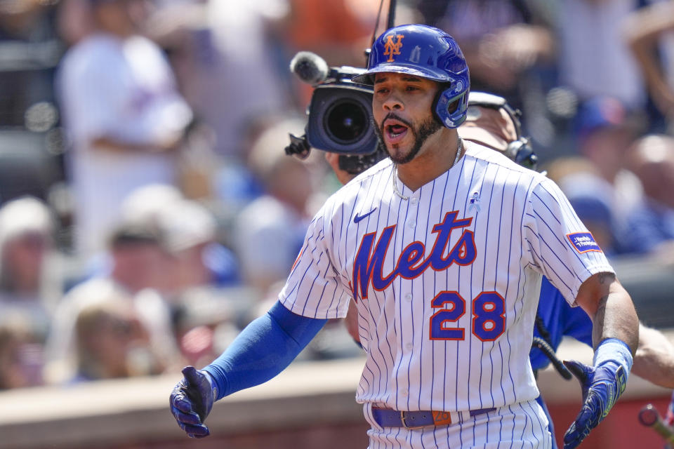 New York Mets' Tommy Pham reacts after hitting a two-run homer during the fifth inning of a baseball game against the St. Louis Cardinals at Citi Field, Sunday, June 18, 2023, in New York. (AP Photo/Seth Wenig)