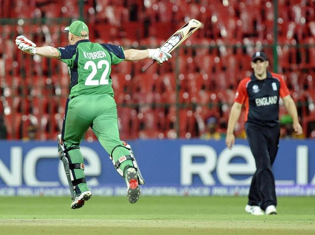 Kevin O’Brien celebrates scoring his World Cup century against England 