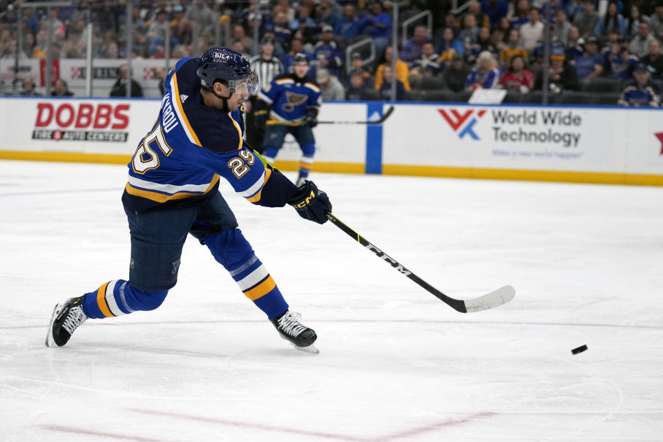 St. Louis Blues' Jordan Kyrou (25) scores during the second period of an NHL hockey game against the Carolina Hurricanes Friday, April 12, 2024, in St. Louis. (AP Photo/Jeff Roberson)