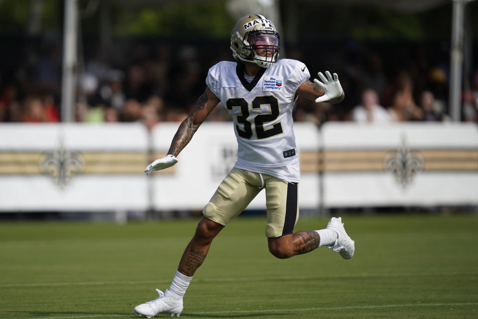 New Orleans Saints safety Tyrann Mathieu (32) runs through drills during training camp at their NFL football training facility in Metairie, La., Thursday, Aug. 4, 2022. (AP Photo/Gerald Herbert)