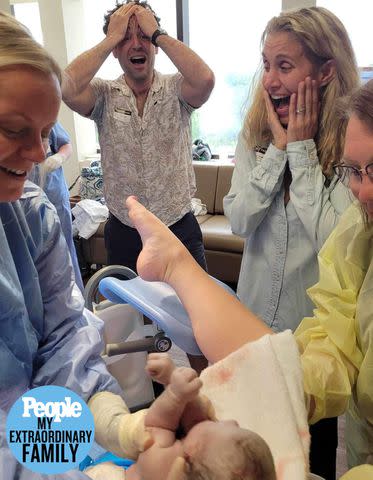 <p>Marisa Merliss</p> Joy from Michael Minarik, left, and Marisa Merliss as baby Maya is born