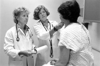 doctors consulting patient