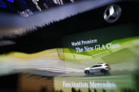 General view of the Mercedes Benz exbition area during a media preview day at the Frankfurt Motor Show (IAA) September 10, 2013. The world's biggest auto show is open to the public September 14 -22. Picture taken with a tilt and shift lens. (REUTERS/Kai Pfaffenbach)