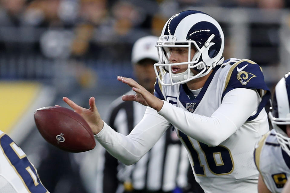 Los Angeles Rams quarterback Jared Goff (16) takes a snap during the first half of an NFL football game against the Pittsburgh Steelers in Pittsburgh, Sunday, Nov. 10, 2019. (AP Photo/Keith Srakocic)