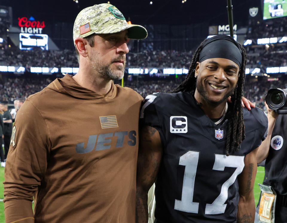 LAS VEGAS, NEVADA - NOVEMBER 12: Quarterback Aaron Rodgers #8 of the New York Jets and wide receiver Davante Adams #17 of the Las Vegas Raiders visit on the field after the Raiders' 16-12 victory over the Jets at Allegiant Stadium on November 12, 2023 in Las Vegas, Nevada. (Photo by Ethan Miller/Getty Images)