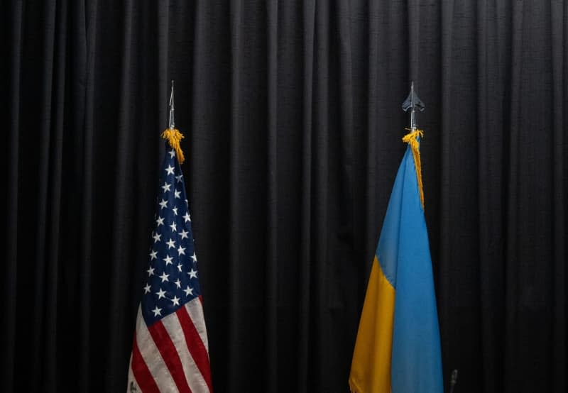 The flags of USA (L) and Ukraine are pictured ahead of the conference on the Ukraine war at the US Ramstein Air Base. Boris Roessler/dpa