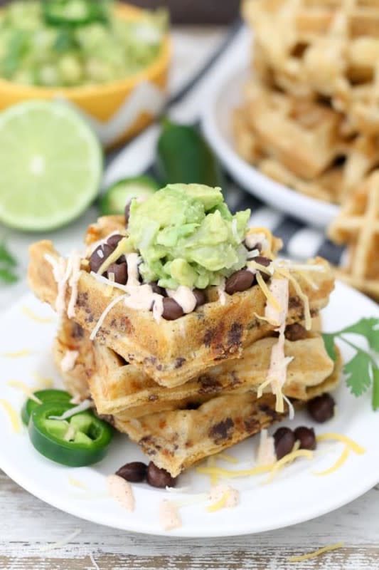 <p>Let your love of tacos know no bounds. Taco shells aren't the only game in town—use your waffle! Stuff it with your favorite taco night ingredients and taco tuesday is delivered again!</p><p><strong>Get The Recipe: <a href="https://beyondfrosting.com/taco-stuffed-waffles/" rel="nofollow noopener" target="_blank" data-ylk="slk:Taco Stuffed Waffles;elm:context_link;itc:0;sec:content-canvas" class="link ">Taco Stuffed Waffles</a></strong></p>