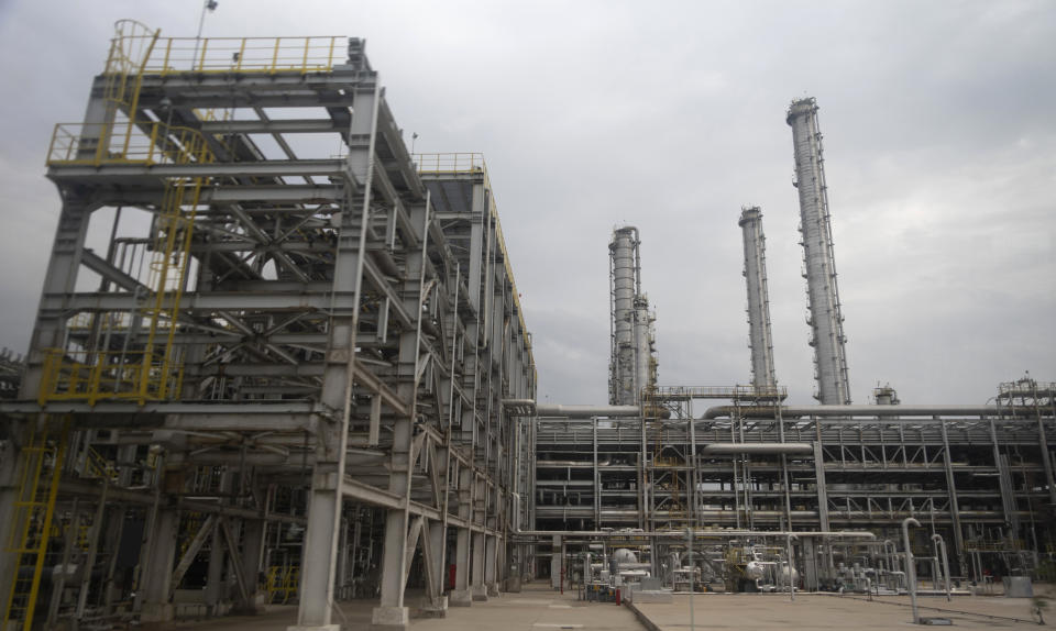 In this July 23, 2019, photo, olefin production facilities are seen inside the Fushun Petrochemical Company in Fushun in northeastern China's Liaoning Province. Authorities in China's rust-belt region are looking for support for its revival from Beijing's multibillion-dollar initiative to build ports, railways and other projects abroad. (AP Photo/Olivia Zhang)