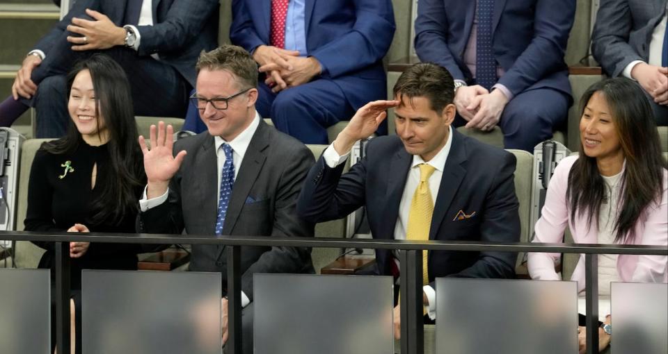 Michael Spavor, centre left, and Michael Kovrig, centre right, receive a standing ovation in the House of Commons prior to U.S. President Joe Biden's address to Parliament in Ottawa on March 24, 2023.