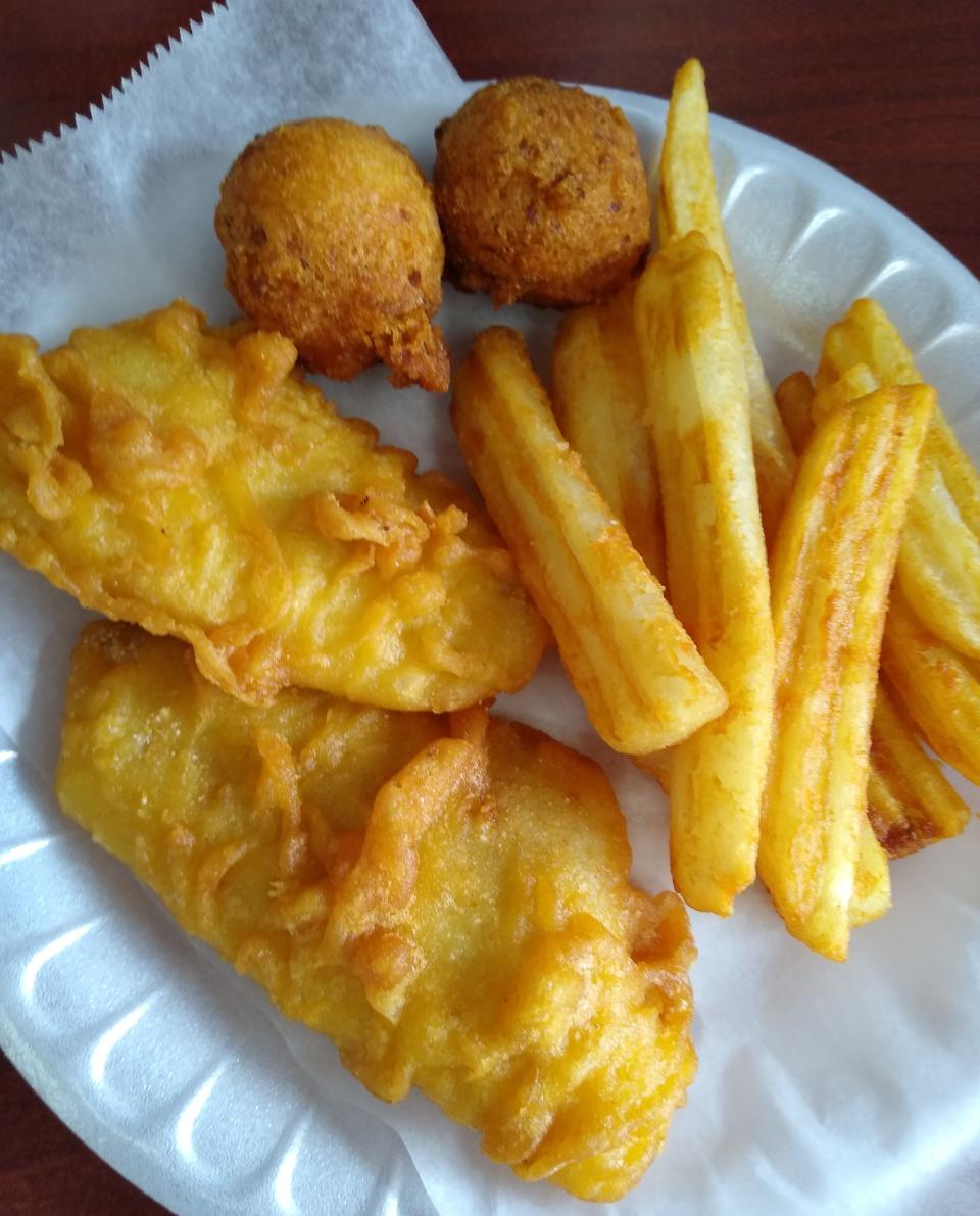 Arthur Treacher's Original Fish & Chips meal comes with two pieces of fish, English-style fried potatoes and two hushpuppies.