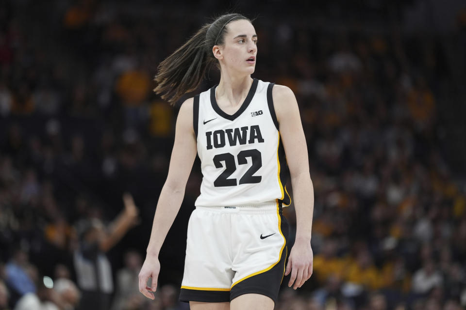 Iowa guard Caitlin Clark (22) stands on the court during the first half of an NCAA college basketball game against Nebraska in the final of the Big Ten women's tournament Sunday, March 10, 2024, in Minneapolis. (AP Photo/Abbie Parr)