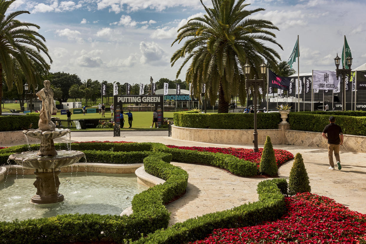 Players practice on a putting green before the LIV Golf tournament at Trump National Doral in Doral, Fla., April 3, 2024. (Scott McIntyre/The New York Times)