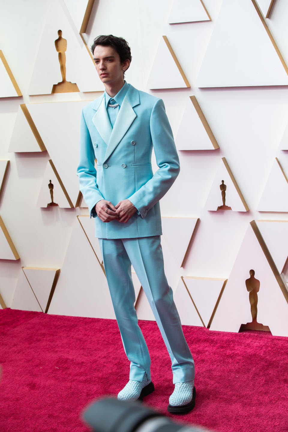 Kodi Smit-McPhee in Bottega Veneta at the 94th Academy Awards held at Dolby Theatre at the Hollywood & Highland Center on March 27th, 2022 in Los Angeles, California.