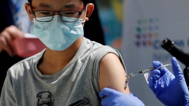 Children receive Pfizer-BioNTech vaccine for the coronavirus disease (COVID-19) in New Hyde Park, New York