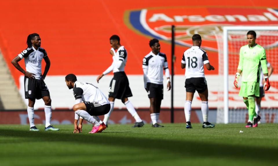 Fulham players can hardly believe it after they saw victory slip from their grasp after 97 minutes