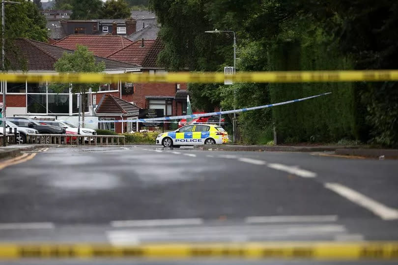 A police cordon at the scene on Moss Bank Way