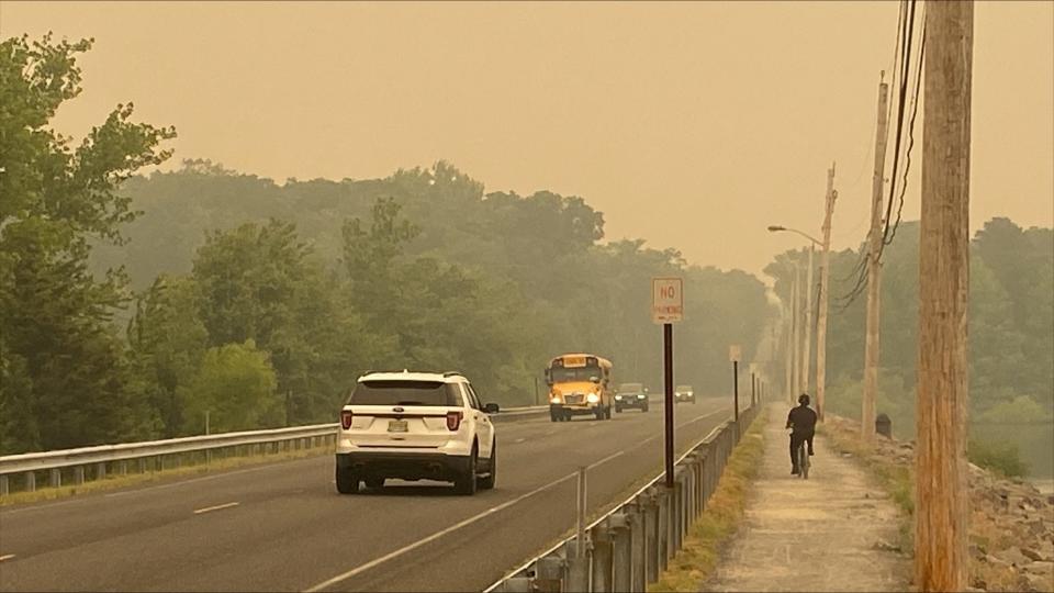 People in the smoke passing the Manasquan Reservoir in Howell