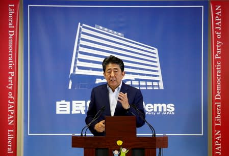 Japan's Prime Minister Shinzo Abe, who is also leader of the Liberal Democratic Party, attends a news conference a day after an upper house election at LDP headquarters in Tokyo