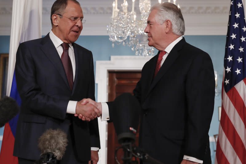 俄羅斯外長拉夫羅夫與美國國務卿提勒森。（美聯社）