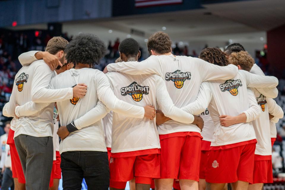 Oct 22, 2023; Dayton, OH, USA;
The Ohio State Buckeyes basketball team huddles up during warmups ahead of their game against the Dayton Flyers on Sunday, Oct. 22, 2023 at the University of Dayton Arena.