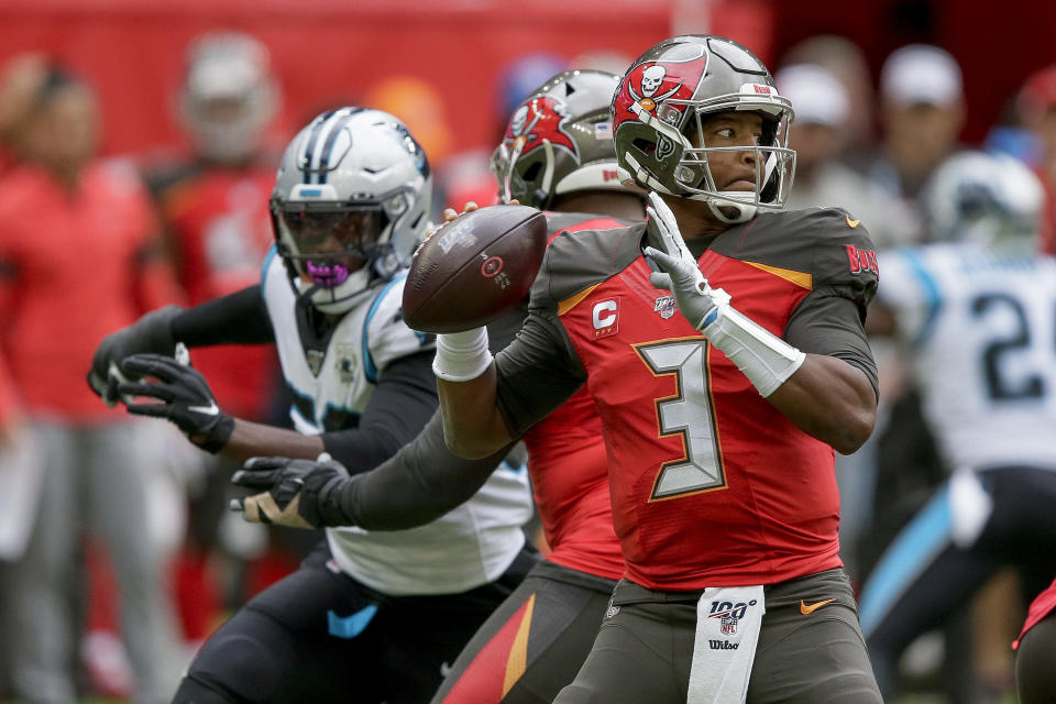 Tampa Bay Buccaneers quarterback Jameis Winston (3) passes against the Carolina Panthers during the second quarter of an NFL football game, Sunday, Oct. 13, 2019, at Tottenham Hotspur Stadium in London. (AP Photo/Tim Ireland)