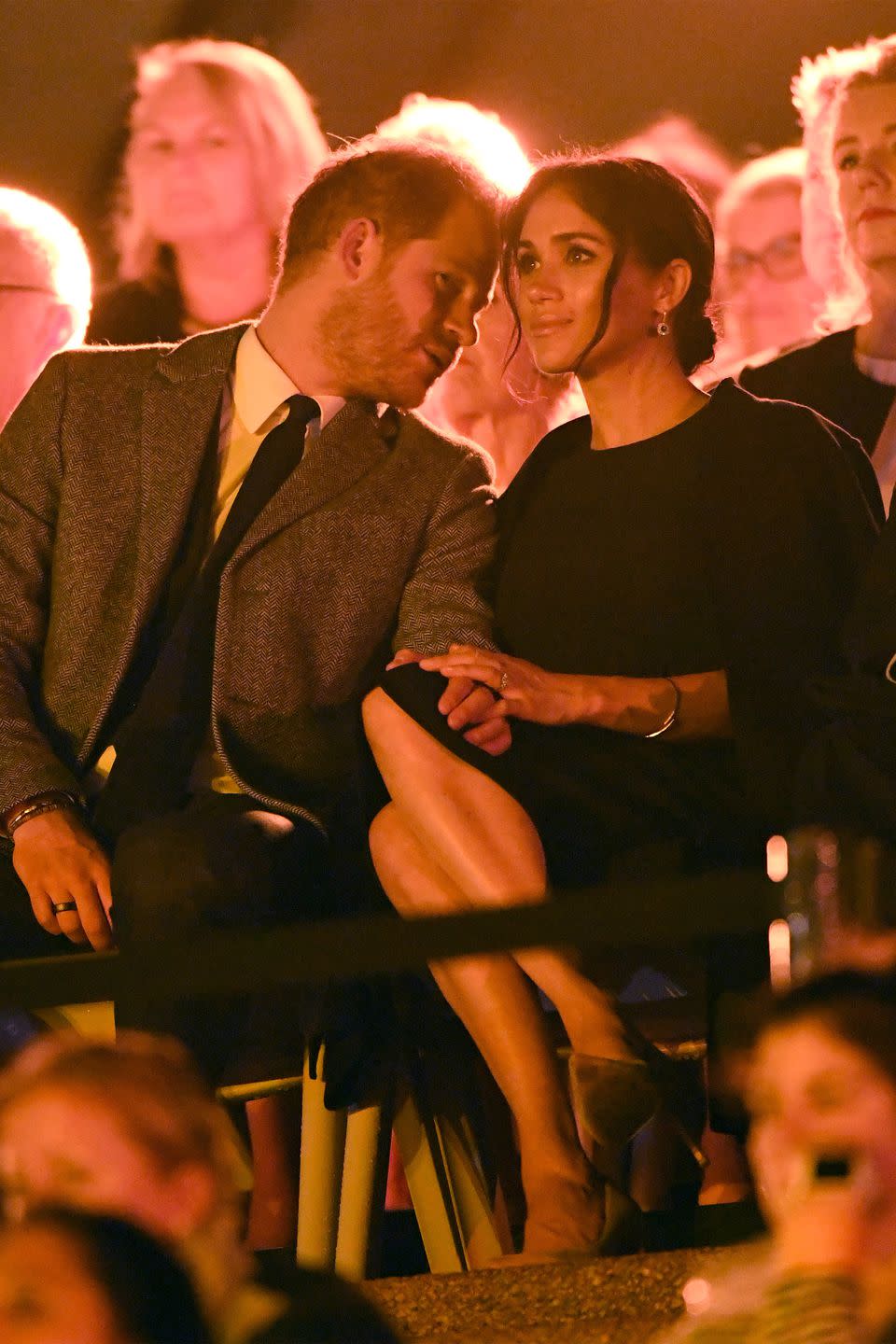 <p>Meghan and Harry at the <a rel="nofollow noopener" href="https://www.harpersbazaar.com/celebrity/latest/g23985144/meghan-markle-prince-harry-invictus-games-opening-ceremony-pda-photos/" target="_blank" data-ylk="slk:opening ceremony of the Invictus Games;elm:context_link;itc:0;sec:content-canvas" class="link ">opening ceremony of the Invictus Games</a>. Meghan is wearing a <a rel="nofollow noopener" href="https://www.harpersbazaar.com/celebrity/latest/a23981667/meghan-markle-royal-tour-australia-stella-mccartney-dress-gillian-anderson-coat/" target="_blank" data-ylk="slk:dress by Stella McCartney;elm:context_link;itc:0;sec:content-canvas" class="link ">dress by Stella McCartney</a>, and a coat by <a rel="nofollow noopener" href="https://www.winserlondon.com/gillian-anderson-for-winser-london/gillian-anderson-wool-swing-coat.html?" target="_blank" data-ylk="slk:Gillian Anderson for Winser;elm:context_link;itc:0;sec:content-canvas" class="link ">Gillian Anderson for Winser</a>.</p>