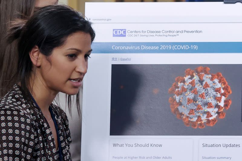 Katie Miller, press secretary for U.S. Vice President Pence, helps prepare for the daily coronavirus task force briefing at the White House in Washington