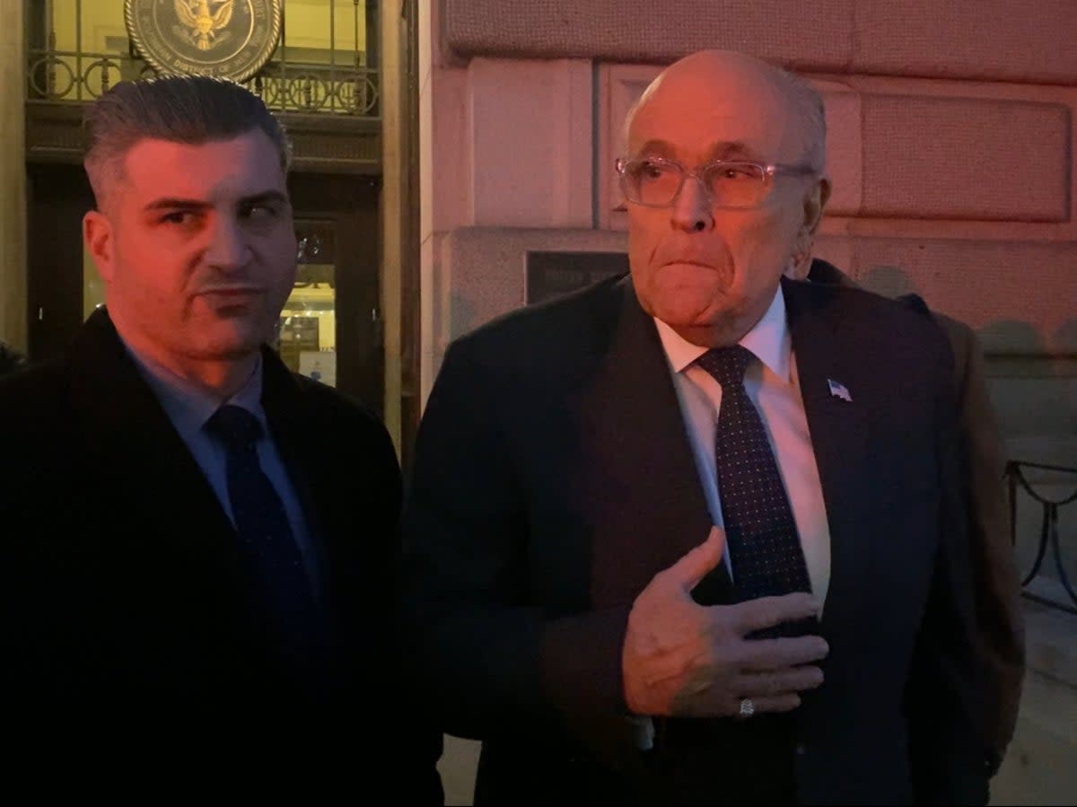Rudy Giuliani appears outside bankruptcy court in Manhattan on 7 February (Alex Woodward/The Independent)