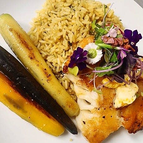 Eat the Chilean Seabass on the patio at The Cove.