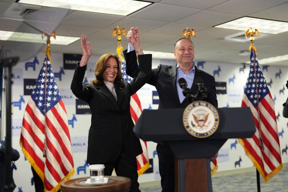 Vice president Kamala Harris and her husband Doug at a campaign event in Delaware (POOL/AFP via Getty Images)