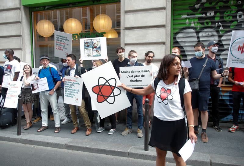 Members of the group "The Voices of Nuclear" demonstrate in reaction to the closure of the Fessenheim nuclear power plant in front of Greenpeace headquarters in Paris