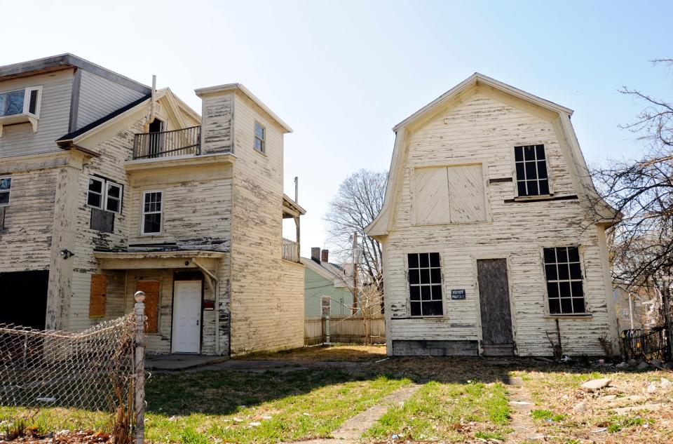 The carriage house behind Rufus Chase House at 114 Austin St. shown in 2012.