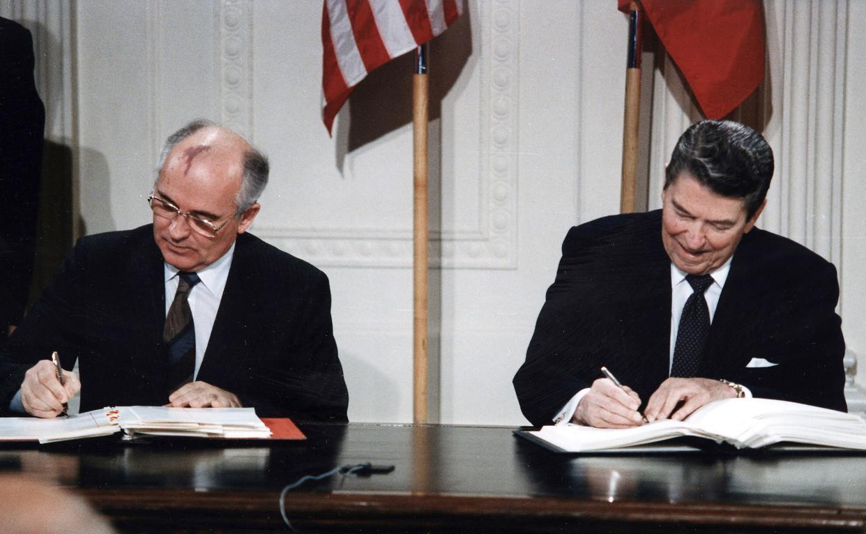 U.S. President Ronald Reagan and Soviet General Secretary Mikhail Gorbachev signing the INF Treaty in the East Room at the White House in 1987. The Intermediate-Range Nuclear Forces Treaty (INF) is a 1987 agreement between the United States and the Soviet Union. The treaty eliminated nuclear and conventional ground-launched ballistic and cruise missiles with intermediate ranges. (Photo by: Photo12/Universal Images Group via Getty Images)