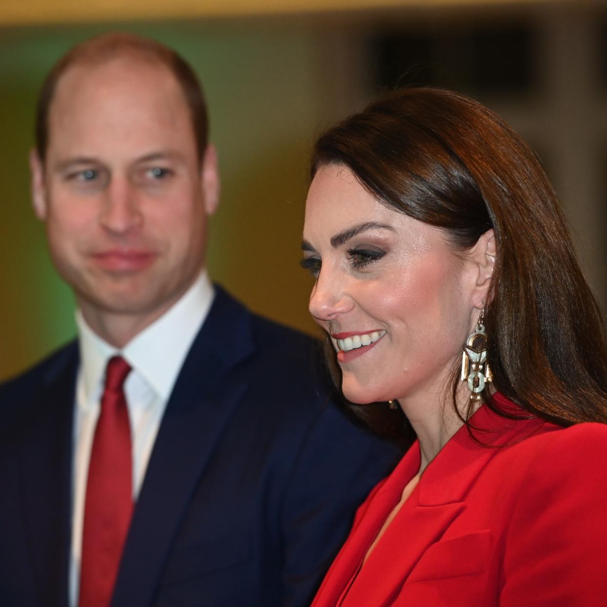  Prince William and Kate Middleton attend an event. 