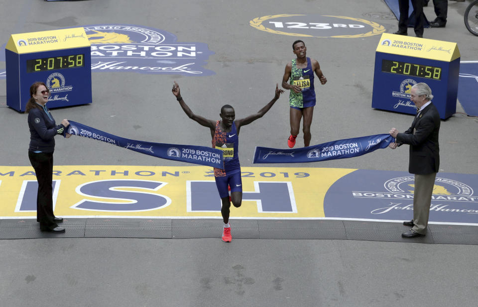 So close, Kenya's Lawrence Cherono, arms raised, out-sprinted Ethiopia's Lelisa Desisa to win the 123rd Boston Marathon on Monday. (AP)