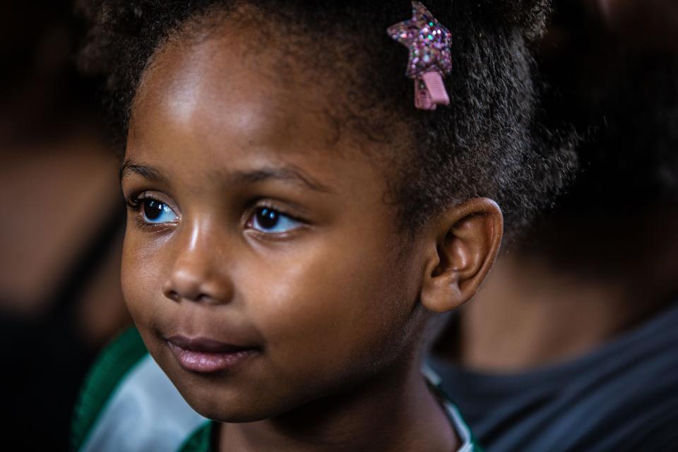 McKenzie Massay, 6, of Mount Vernon listens to spiritual songs being sung during ÒA Celebration of JuneteenthÓ at St. PaulÕs Church National Historic Site in Mount Vernon June 19, 2023. Juneteenth is the federal holiday commemorating the emancipation of enslaved African Americans. The ceremony at St. PaulÕs Church included a sing-a-long, performances by flutist Eric Thomas, bass baritone singer Ronald Campbell, the gospel choir of the Greater Centennial A.M.E. Zion Church in Mount Vernon, an address by Mount Vernon Mayor Shawyn Patterson-Howard, and the reading of the original proclamation declaring the end of slavery in Texas. 