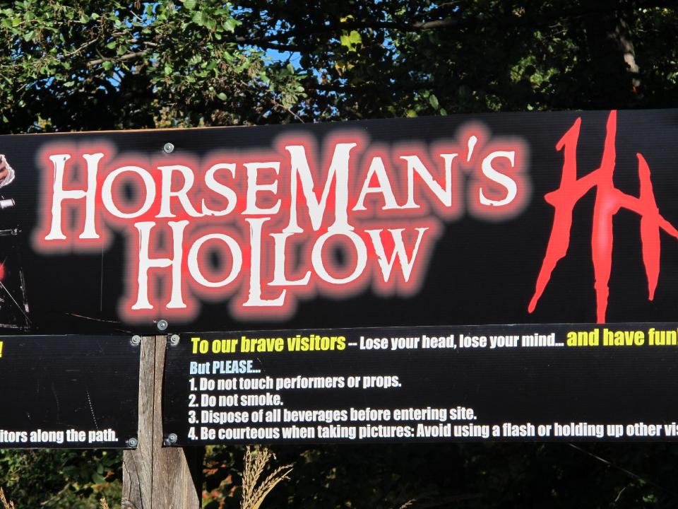 This photo of Oct. 18, 2013, shows the entrance to a Halloween attraction in Sleepy Hollow, N.Y. The village of Sleepy Hollow is even busier than usual this Halloween, thanks to a new "Sleepy Hollow" TV series inspired by the tale of the Headless Horseman. (AP Photo/Jim Fitzgerald)