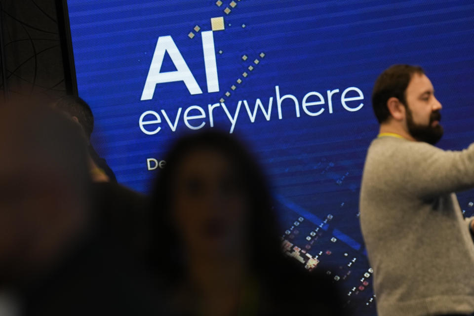 Signs display the name of an Intel event called AI Everywhere in New York, Thursday, Dec. 14, 2023. Intel is introducing new products that are designed to be used with AI powered computers and applications. (AP Photo/Seth Wenig)