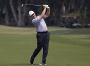 South Africa's Ernie Els plays his second shot on the first hole during the Australian Open Golf Pro-AM in Sydney, Wednesday, Dec. 4, 2019. The Australian Open begins Thursday. (AP Photo/Rick Rycroft)