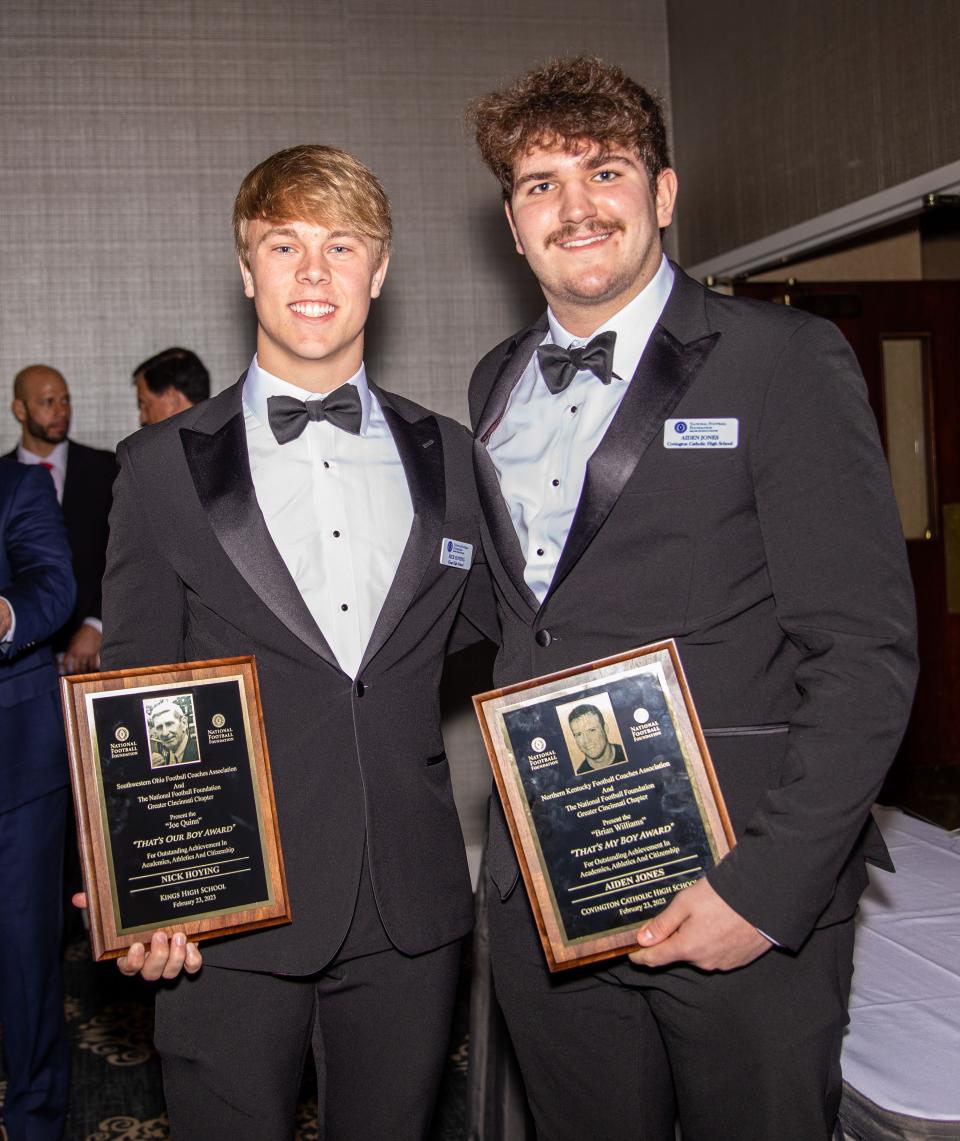 Kings' Nick Hoying (left) and Covington Catholic's Aiden Jones (right) won awards at the Greater Cincinnati Chapter of the National Football Foundation's 56th Annual Scholar-Athlete Banquet Thursday, Feb. 23, 2023.