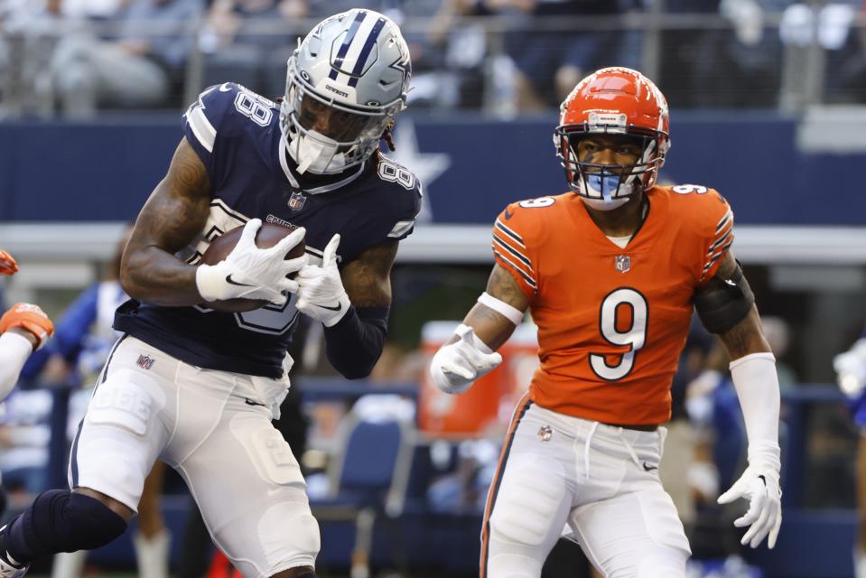 Dallas Cowboys' CeeDee Lamb catches a touchdown pass in front of Chicago Bears' Jaquan Brisker during the first half of an NFL football game Sunday, Oct. 30, 2022, in Arlington, Texas. (AP Photo/Ron Jenkins)