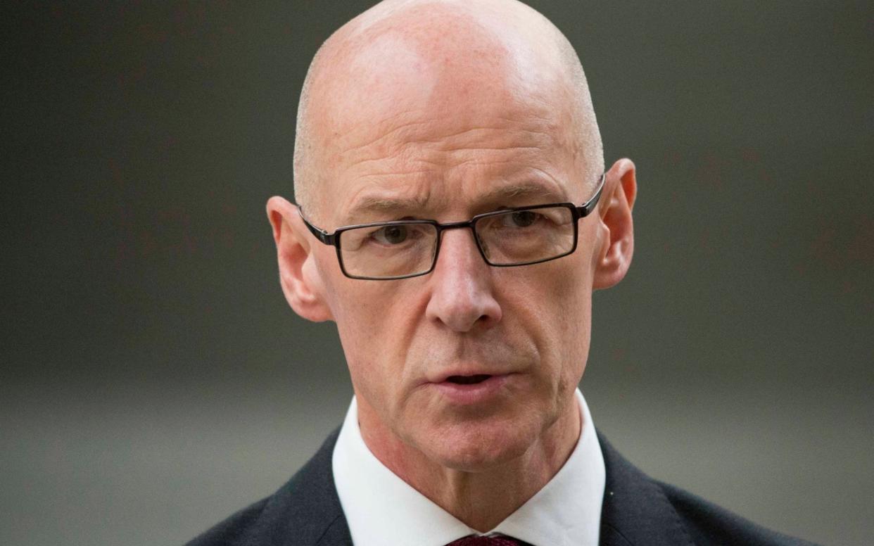 John Swinney confirmed the major climbdown on Tuesday - PA/Colin Fisher 