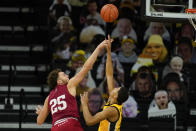 Indiana forward Race Thompson (25) is fouled by Iowa forward Keegan Murray during the second half of an NCAA college basketball game, Thursday, Jan. 21, 2021, in Iowa City, Iowa. Indiana won 81-69. (AP Photo/Charlie Neibergall)