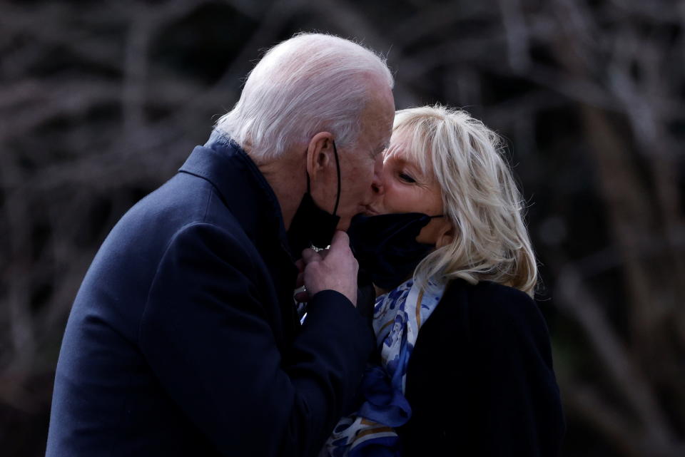 President Joe Biden and first lady Jill Biden kiss goodbye outside the White House in January 2021. (Photo: REUTERS/Tom Brenner)