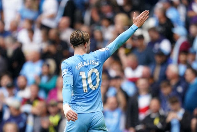 Jack Grealish salutes the crowd