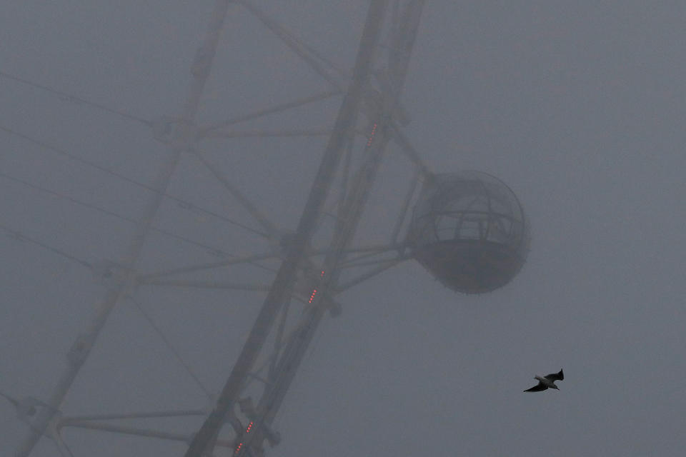 The London Eye on a foggy morning in Britain